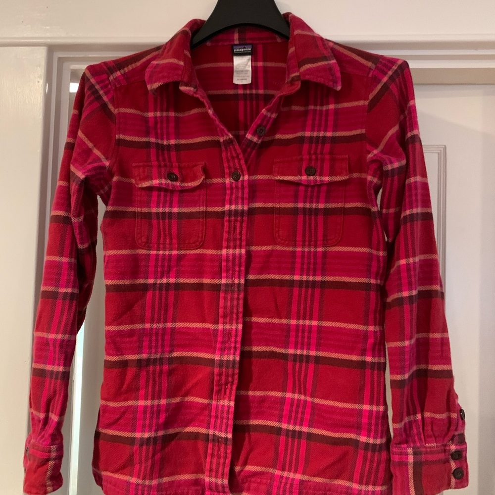 Two Patagonia Women’s 2. Organic cotton flannel. Set of two, one pink one blue.
